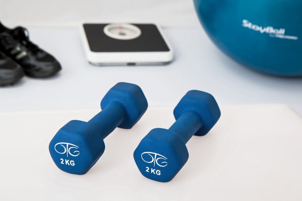 Barbells, a ball and scale are workout gear you could borrow from your hotel to exercise in your room.