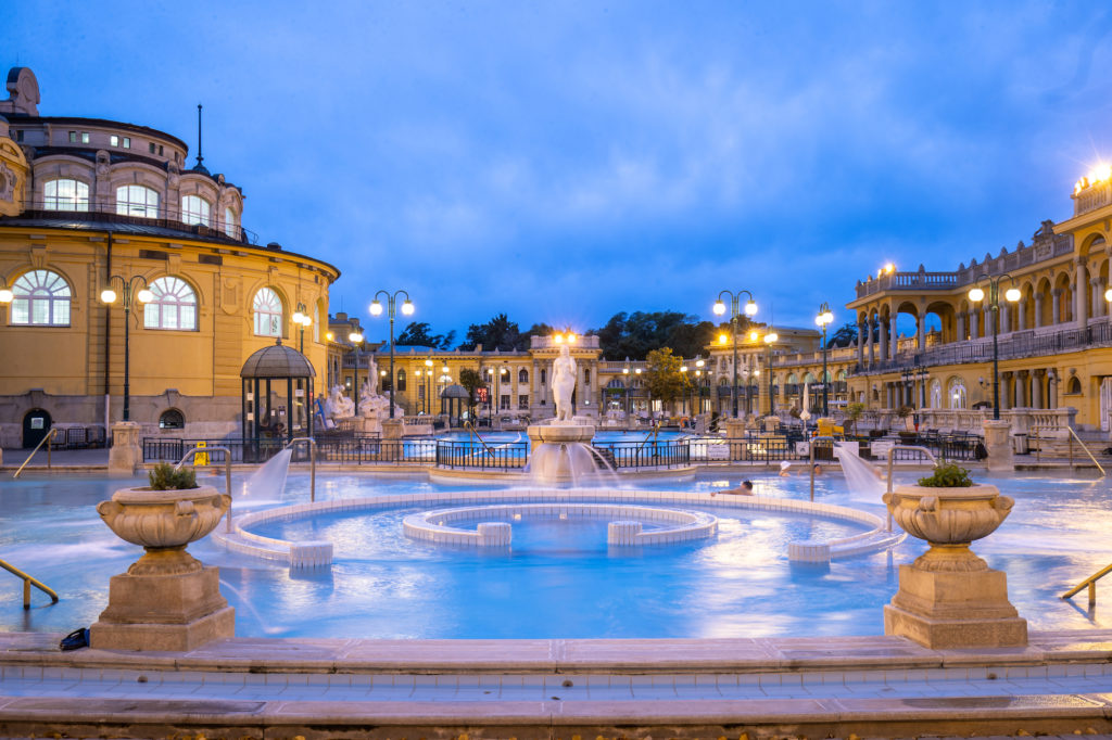 The historic Szechenyi Baths in Budapest, Hungary offer wellness bathing in mineral waters both indoors and out. Photo c. VisitHungary.com