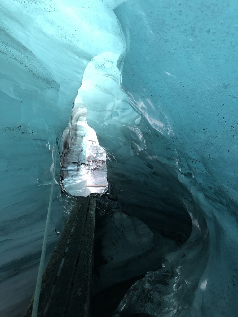 Blue and white cave formed of melted glacial ice in Iceland. Photo c. Bethany Kandel.