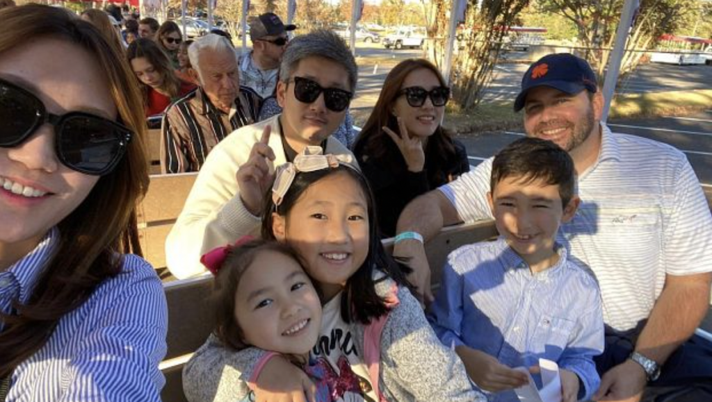 Families take selfie on weekend trolley tour at Callaway Gardens, Georgia.