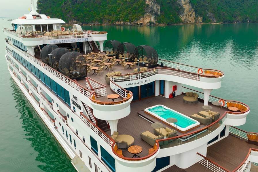 Aerial view of the Ambassador Cruise I ship in Halong Bay reveals two sundecks and a back jacuzzi for passenger use.