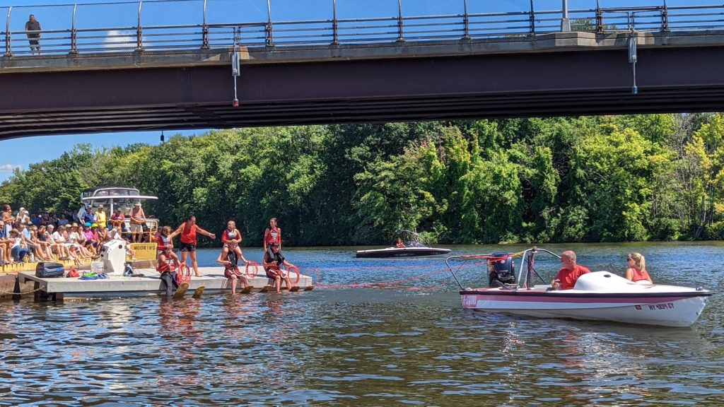 Water skiers get ready on the dock to perform in a water ski show on Oneida Lake at Sylvan Beach, New York.