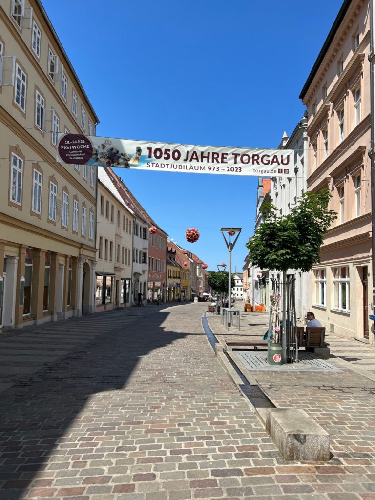 Banner says 'The Altstadt or Old Town of Torgau turned 1,050 years old this year'