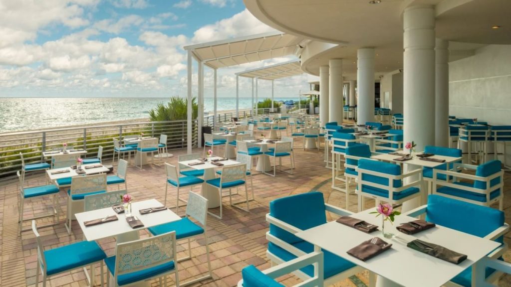 The Playa Restaurant and deck overlooks the beach at The Diplomat Resort in Hollywood, Florida.