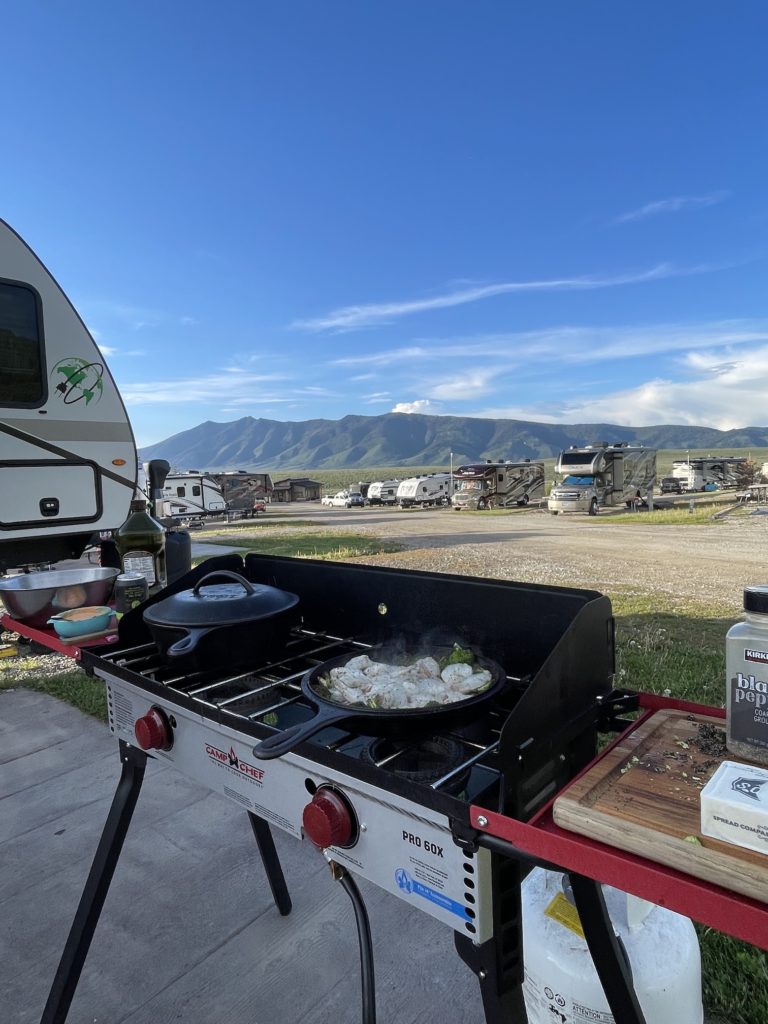View of an outdoor camping kitchen set up at Red Rock RV Park in Island Park, Idaho. Photo by Lindsey Scot Ernst.