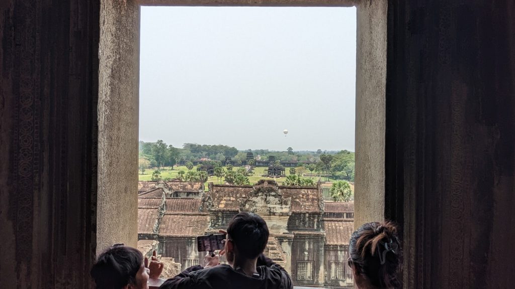 Looking out over Siem Reap from the top throne room at the palace of Angkor Wat, Siem Reap, Cambodia. Photo by Ron Bozman for Spring Hill Productions.