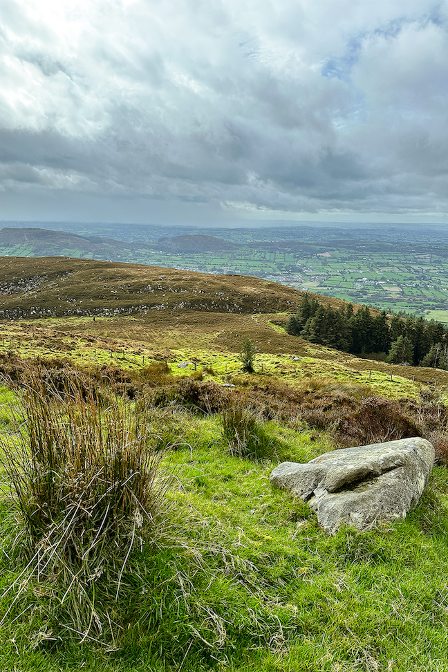 The perfect view of the moors and fields of the Emerald Isle from Slieve Guillion in Ireland