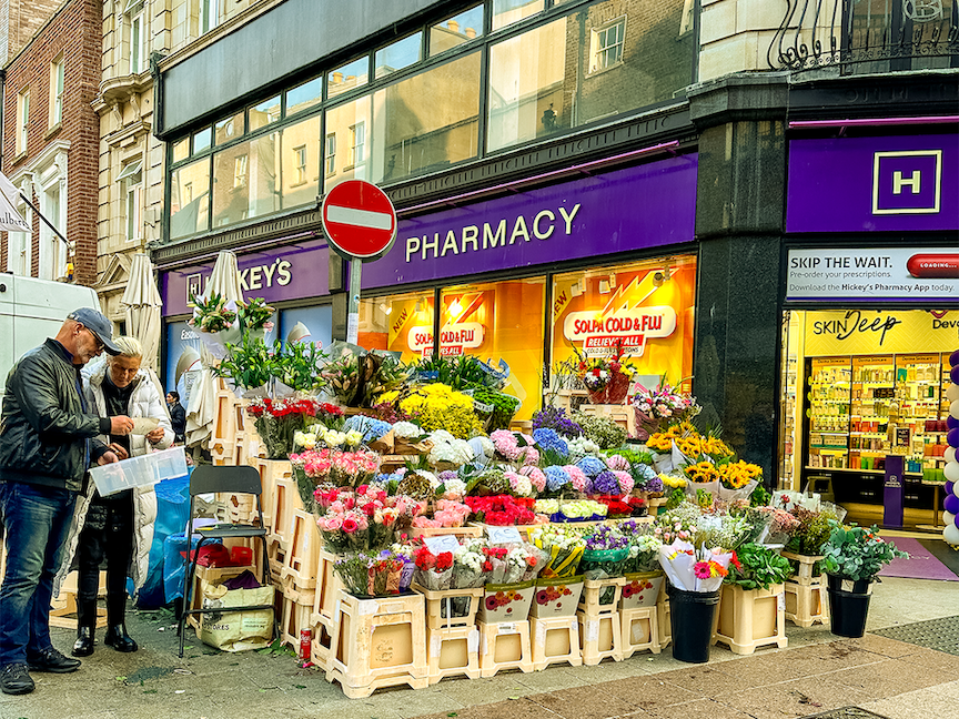 Flower stand outside shop on Grafton Street, Dublin.