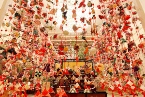 Japanese silk ornaments decorate the Keio Plaza Hotel lobby for the Hina Matsuri Girls Doll Festival. Photo c. Keio Plaza