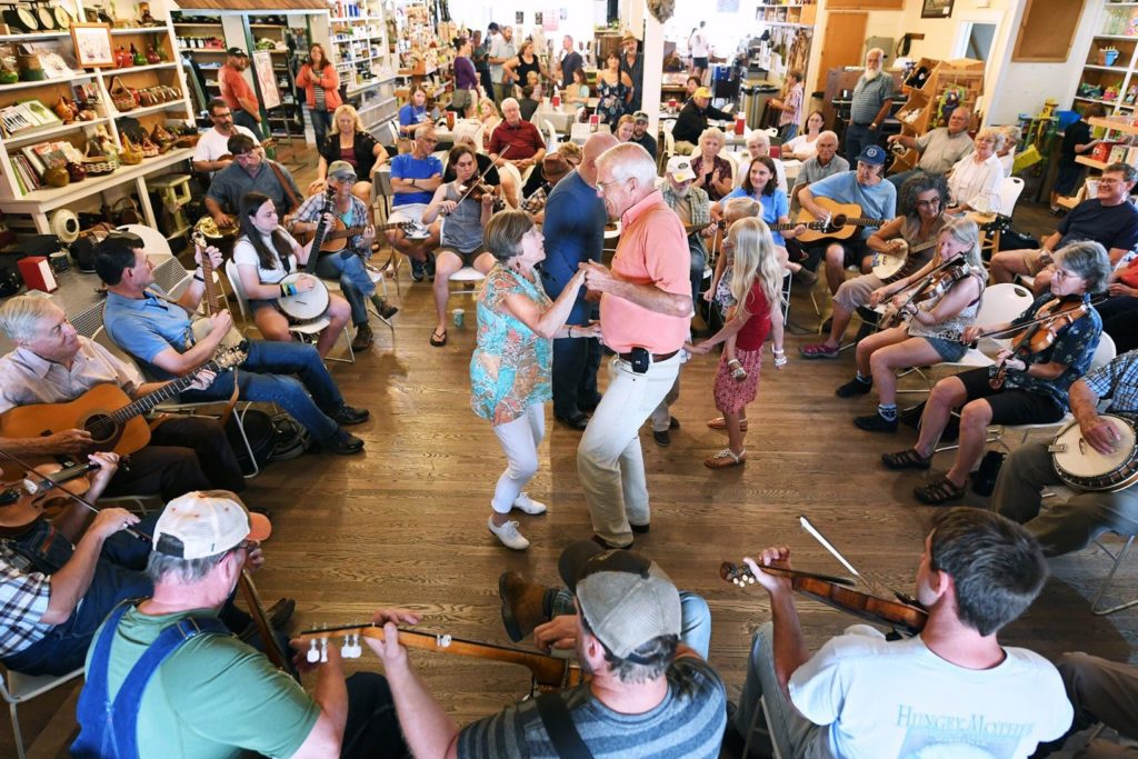 Couples dancing to live music at the Sunday Jamboree in the Floyd Country Store, along the Crooked Road. Photo c. Floyd Country Store.