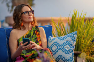 Tina Fey stars in a Super Bowl ad for Booking.com and dreams about travel from her Miami villa.