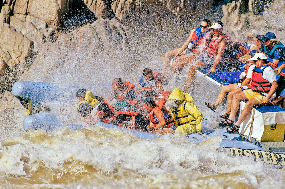 A j-rig motorized raft encounters whitewater on the Grand Canyon. Photo c. Western River Expeditions.