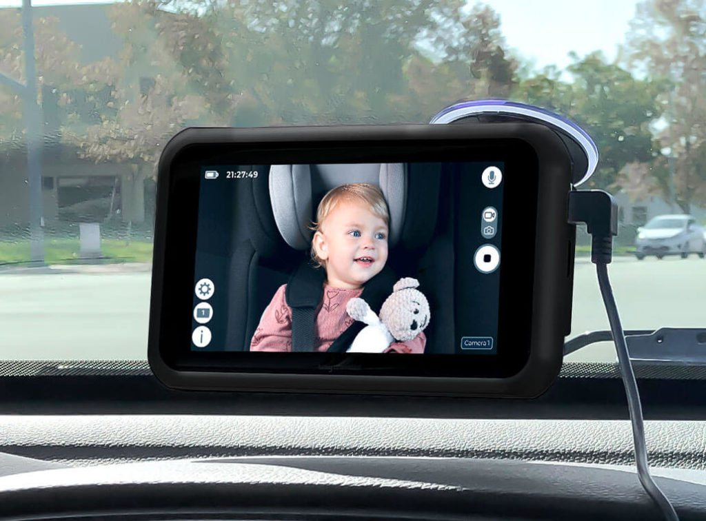 A Tiny Traveler brand HD camera and video monitor lets driver safely check on passengers in the backseat. Photo c. MyTinyTraveler.com