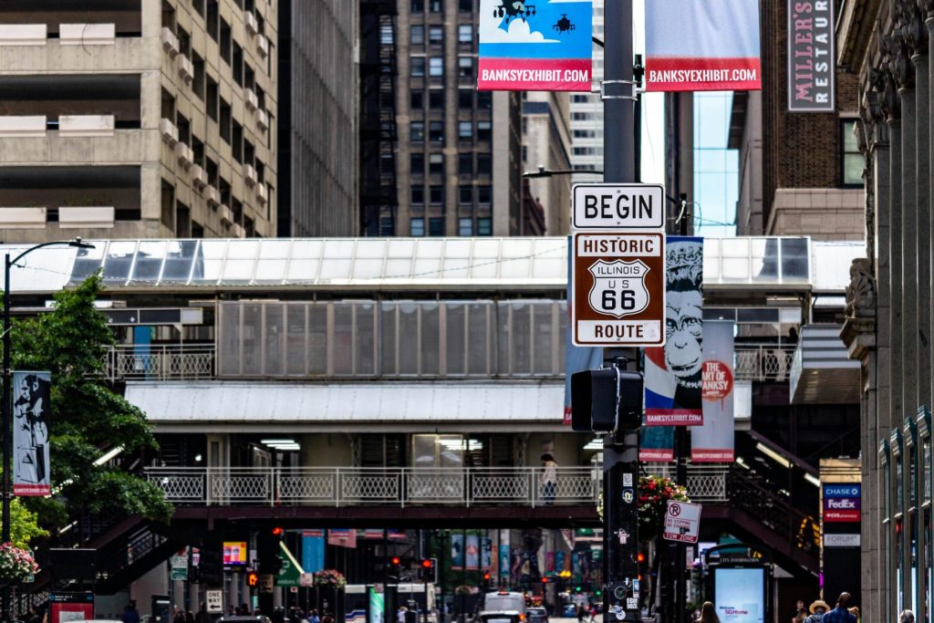 Route 66 sign marks the beginning of the Mother Road in Chicago. Photo by Tio Hugo for pexels.