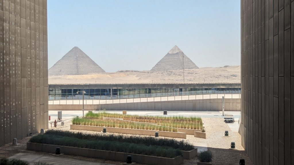 The Pyramids of Khufu (left) and Khafre (right) in Giza are just beyond the gardens at the newly opened GEM. Photo c. Ron Bozman/Spring Hill Prods.