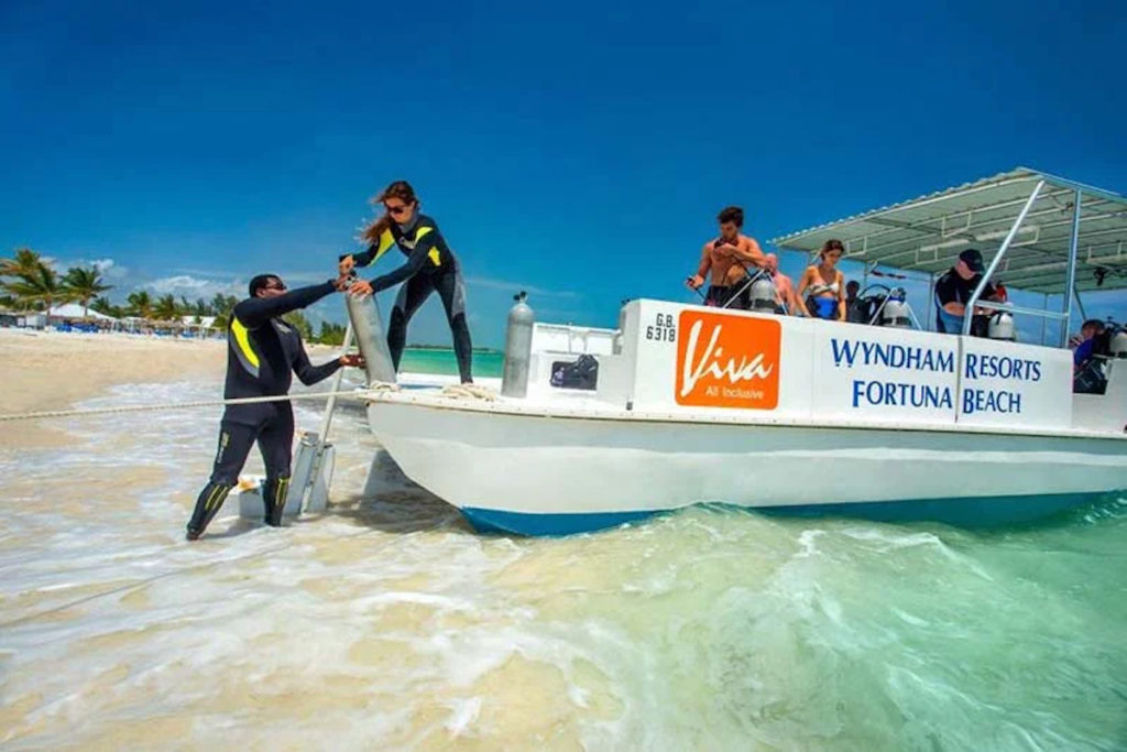 Boat running snorkel and scuba diving trips from Viva Fortuna Beach by Wyndham. Grand Bahama Island is located on one of the world's largest coral reefs. Photo c. Viva Wyndham