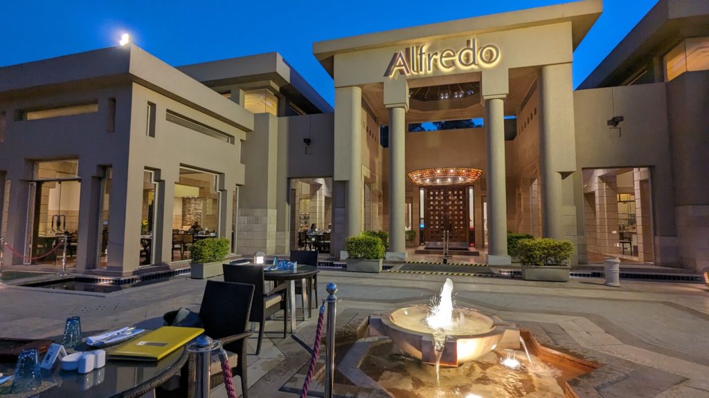 Exterior dining at Alfredo's Restaurant by the fountains of The Mena House Hotel. 