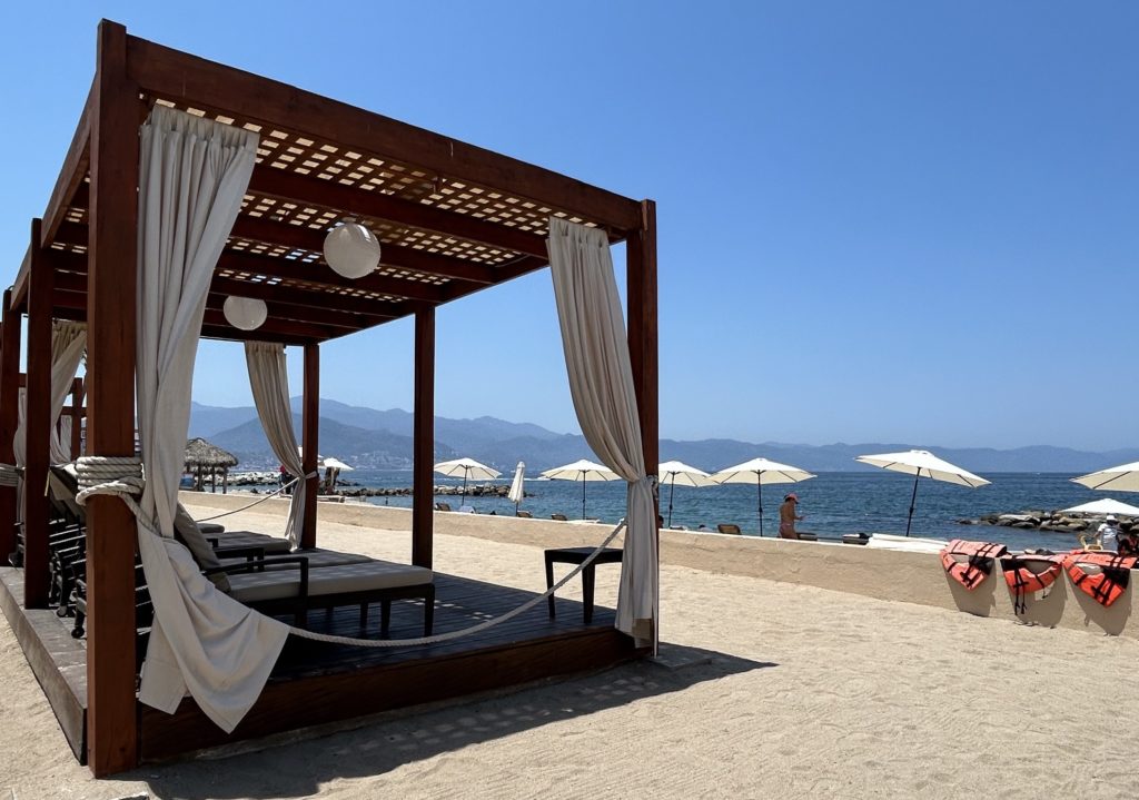 Wood and canvas Pergolas provide shade and privacy at the Westin's Puero Vallarta beach. Photo c. Laura Sutherland