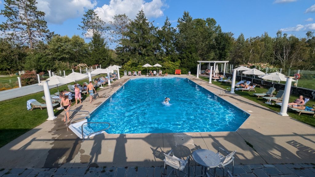 Outdoor heated pool at Mountain View Grand, a New Hampshire luxury spa resort in the White Mountains.