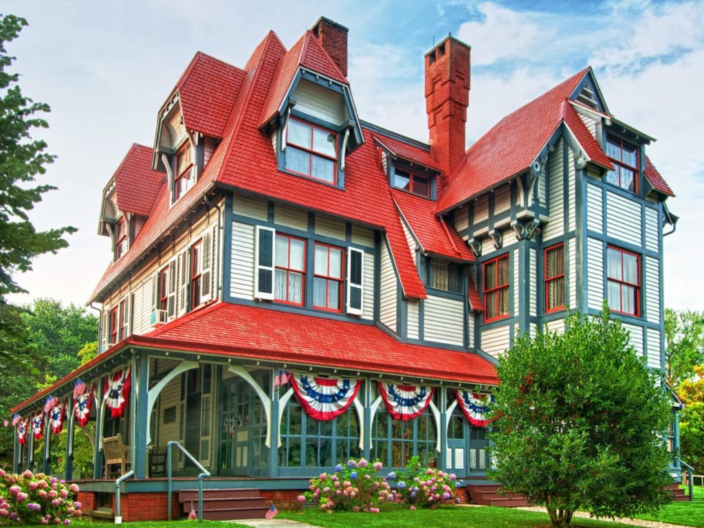 A very Victorian style house in Cape May, NJ decorated in red, white and blue for the Independence Day holiday. Photo c. Virginia Hotel