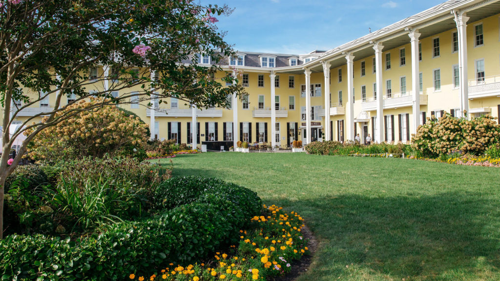 Stately Congress Hall, surrounded by lawns and beautiful landscaping, is the oldest seaside resort in America. Photo c. Cape Resorts.