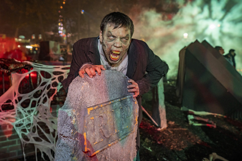 A graveyard ghoul greets anyone who dares enter the cemetery at Six Flags Fright Fest Extreme.