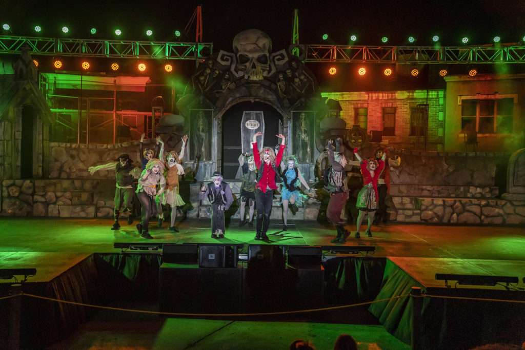 Actors on stage do the Dead Man's Party at Six Flags Fright Fest Extreme Halloween celebrations.