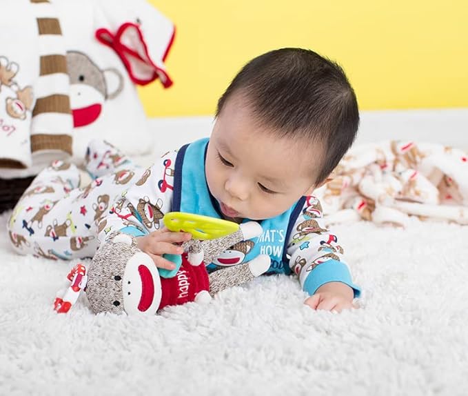 Babies love this cuddly, mutl-use sock monkey toy which promises to keep little ones happy and busy. Photo c. Amazon