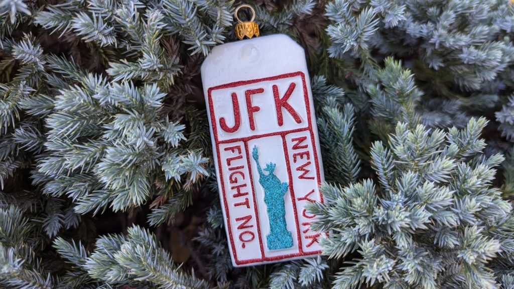 Glass holiday ornaments that commemorate an adventure are an ideal gift for frequent travelers.