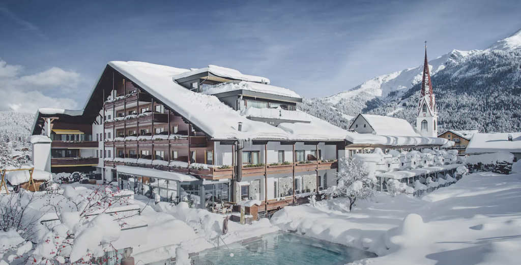 The Hotel Klosterbrau family spa resort blanketed in snow is in the beautiful town of Seefeld in the Tyrol region of Austria. Photo c. GreenPearls