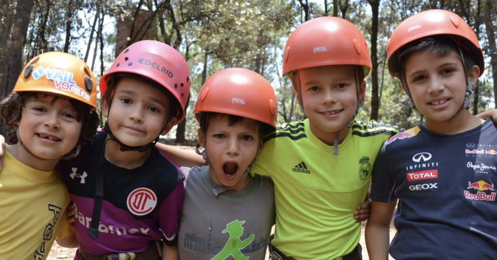 At the Rodaventuras Kidsclub in Mexico, kids fulfill a bucket list adventure to zip line above the trees! Photo c. Rodaventos Hotels.