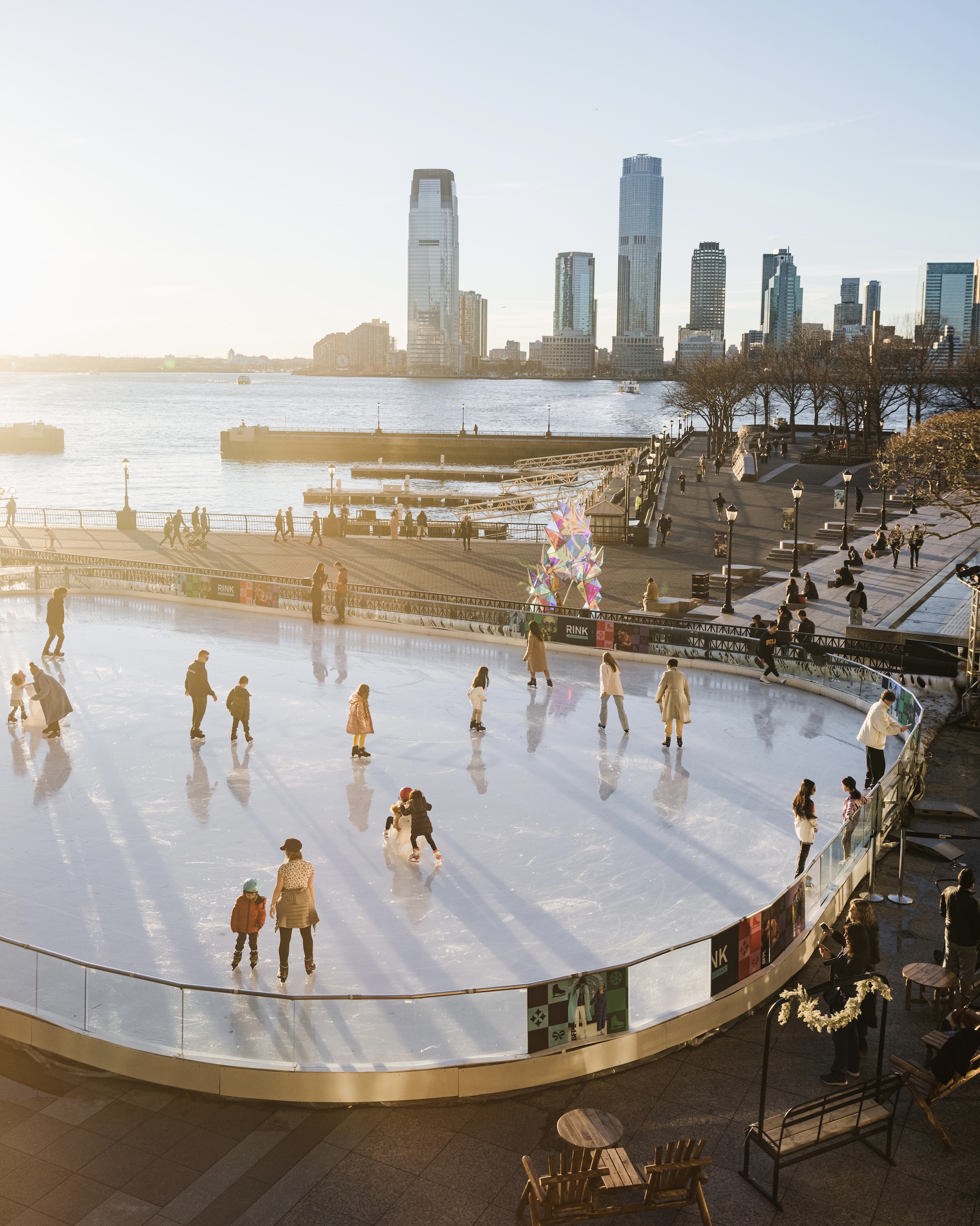 Enjoy skating to views of the Statue of Liberty and Highline at the Brookfield Place rink, next to the Winter Garden. Photo c. Joe Thomas