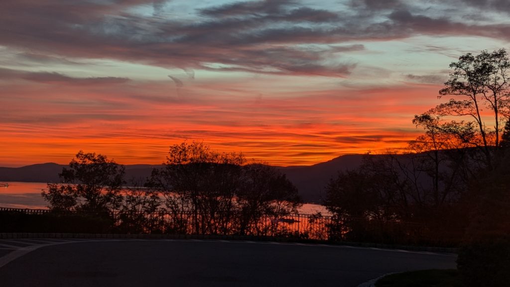 The sun sets over the Hudson River and provides great views to diners at Apropos, the Abbey Inn & Spa in Peekskill, New York.