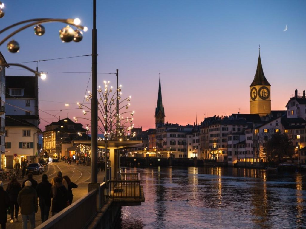 Try taking a canal boat to the Swiss Christmas Market at Limmat, one of Zurich's favorite holiday traditions. Photo c. Zurich Tourism