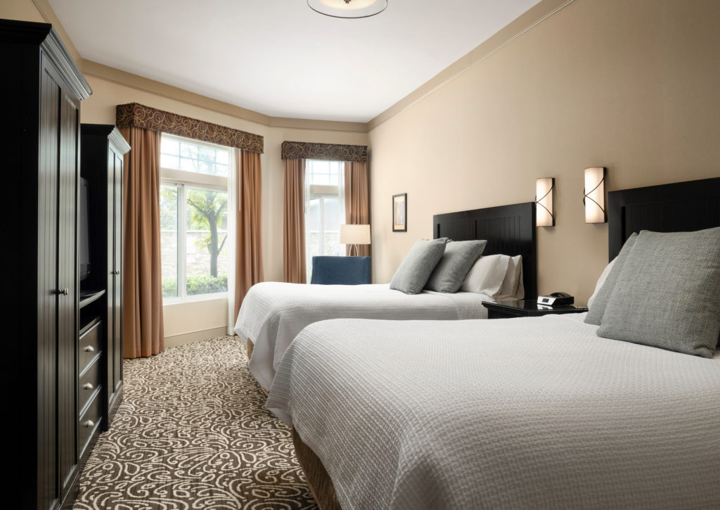 Spacious king double room at West Inn & Suites in Carlsbad. Photo c. VisitCarlsbad