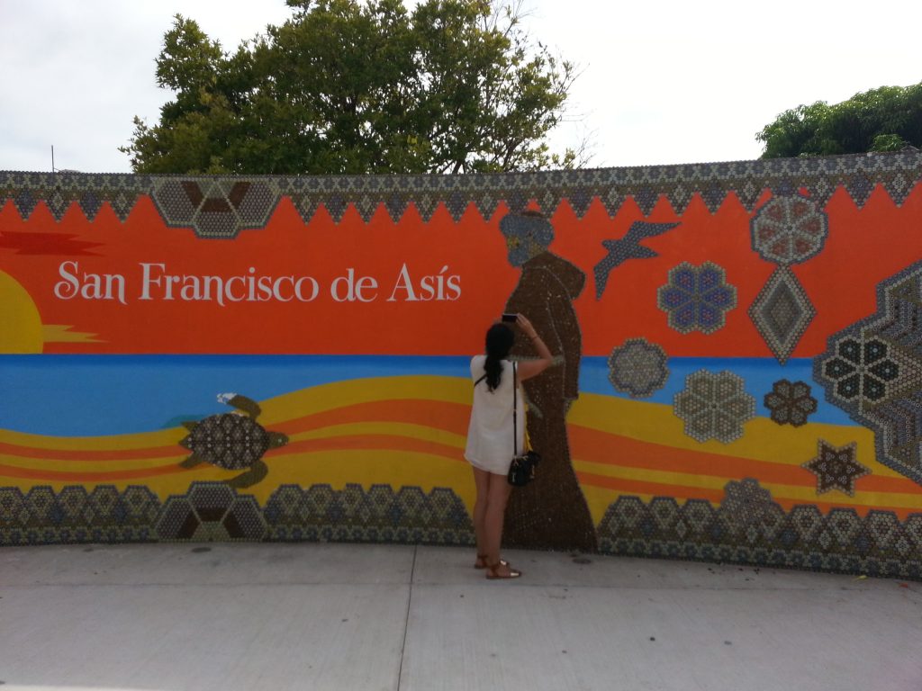 Visitors love the bottlecap mural in San Pancho.