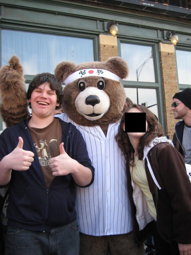 Boy with bear mascot