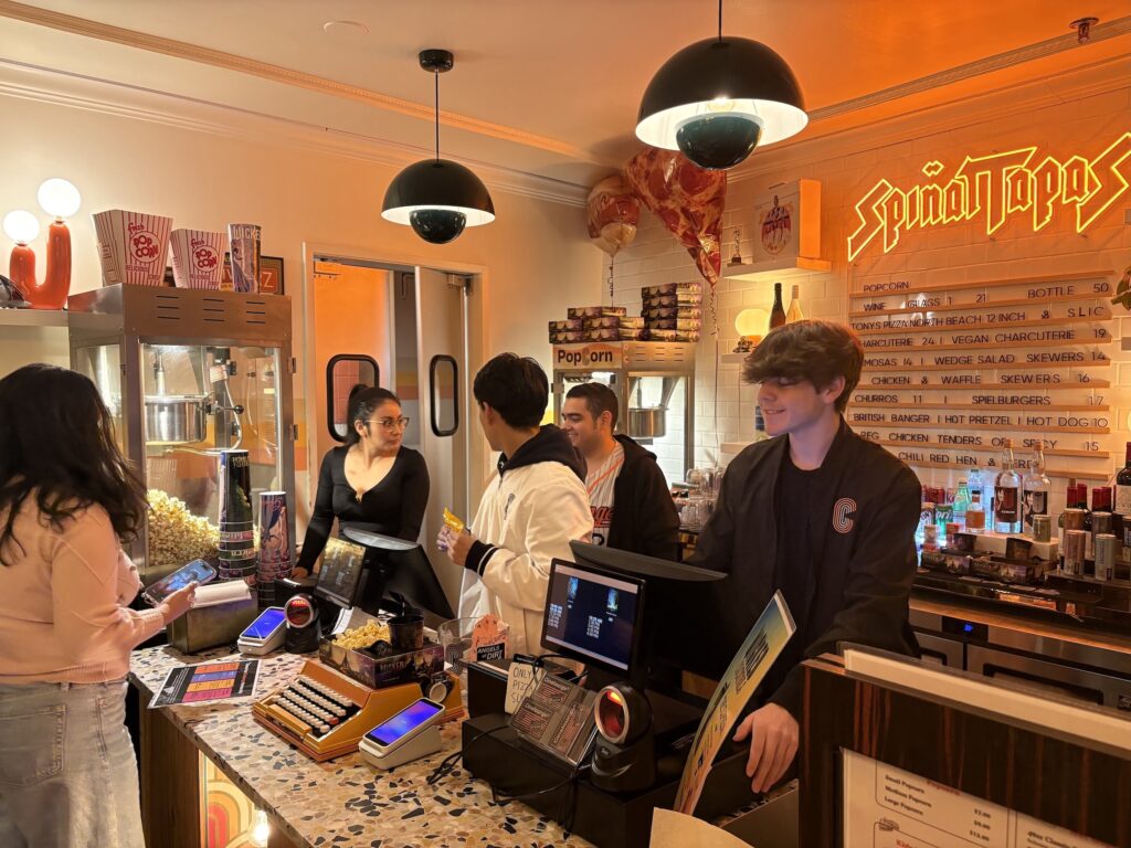 The Spinal Tapas Snack Bar of the Cinelounge Tiburon welcomes families to a fun movie-going experience.