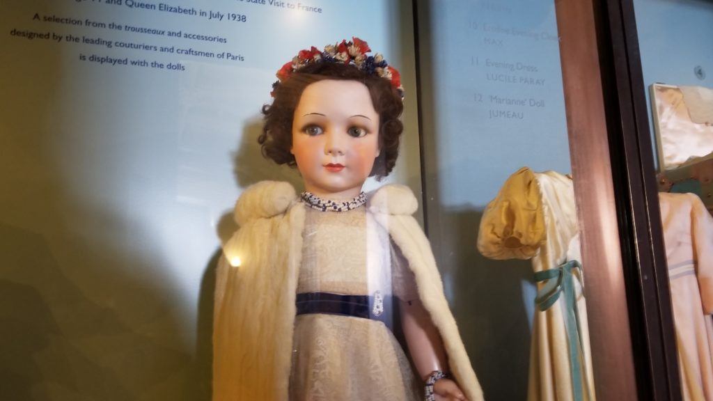 Queen Elizabeth's doll was dressed by famous French couturiers and wears a real ermine stole.
