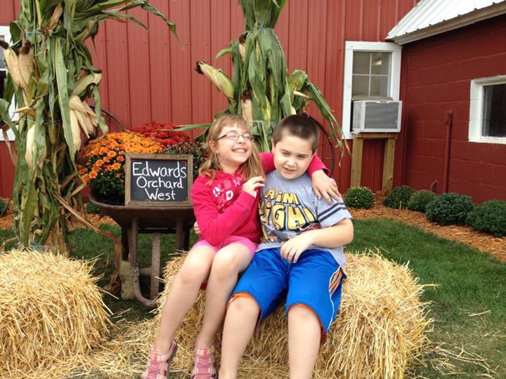 Kids on hay bale at Edwards Orchard, Illinois