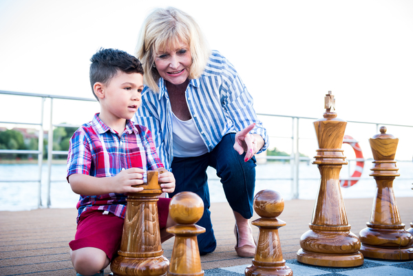 Playing chess on the sundeck of a Uniworld river cruise is fun for all ages. Photo c. Uniworld