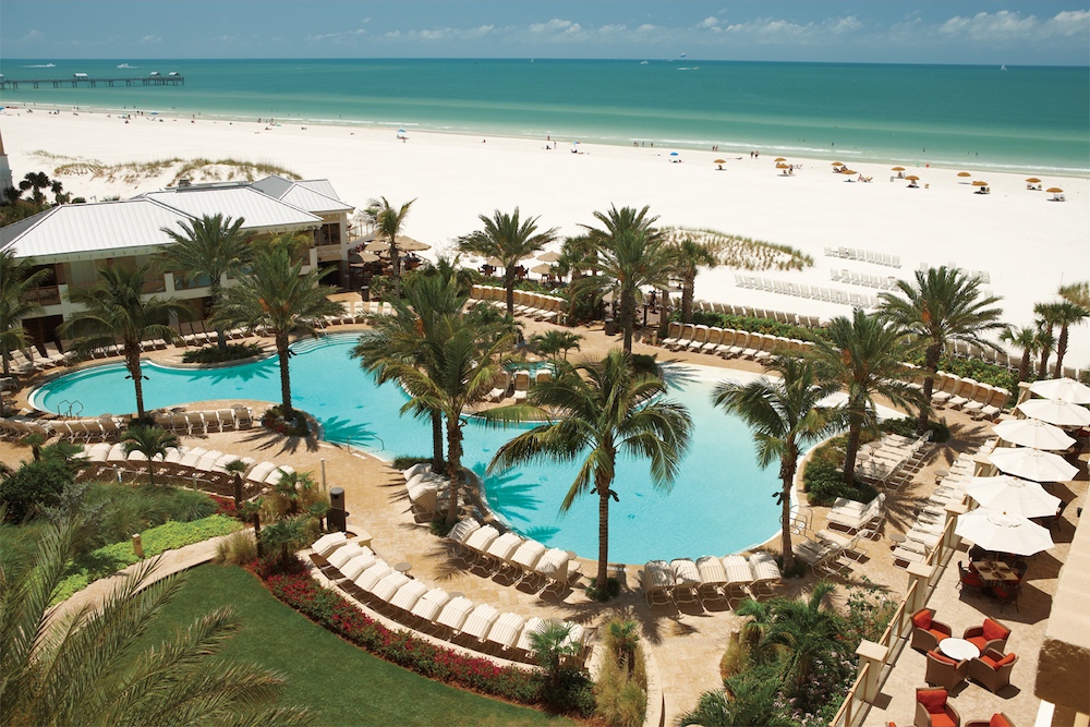 The Sandpearl resort boasts a lagoon pool right along the beautiful white sand beach of Clearwater, Florida.