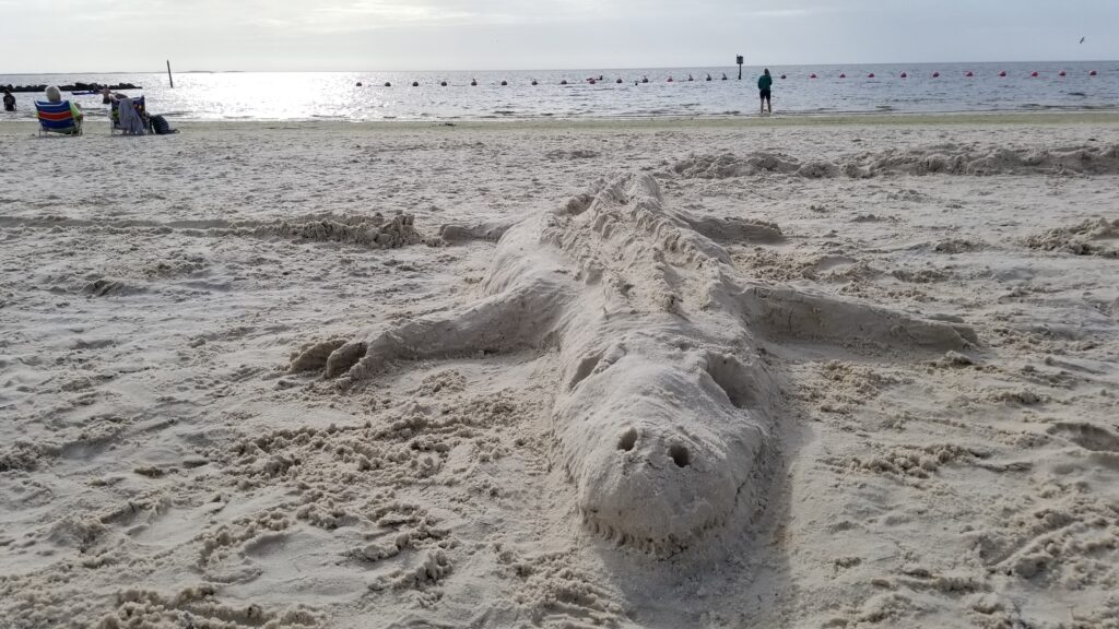 Alligator sand sculpture at Fort Island State Park.