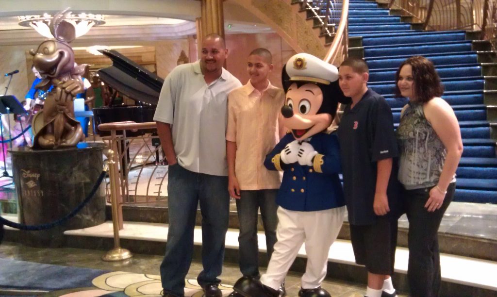 Captain Mickey welcomes families aboard the Disney Fantasy.