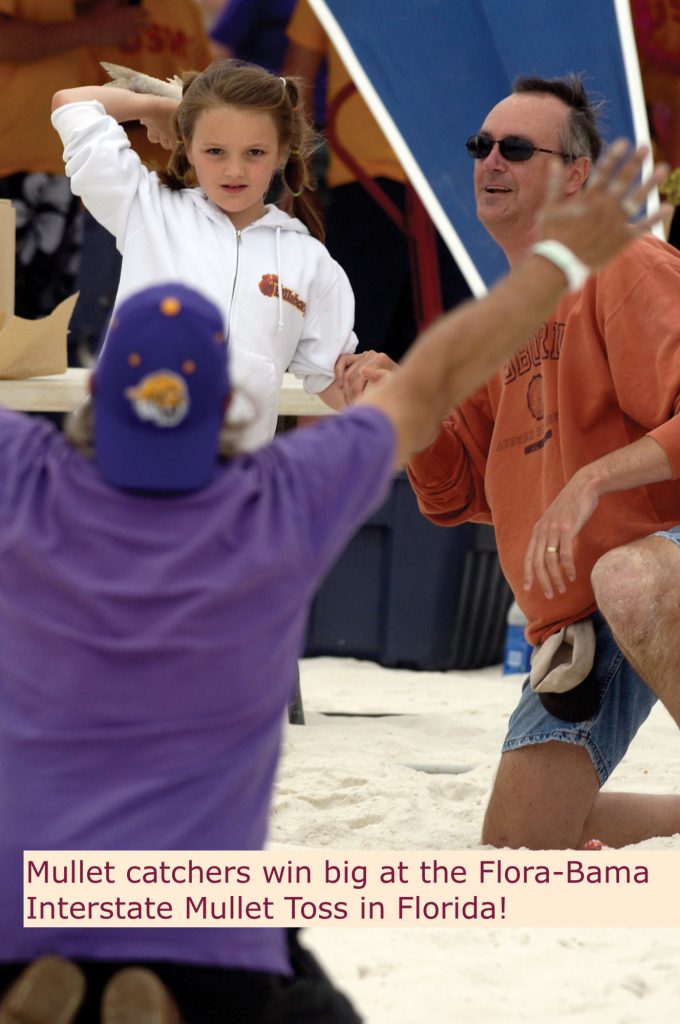 Girl tossing mullet at Flora-Bama Interstate Mullet Toss