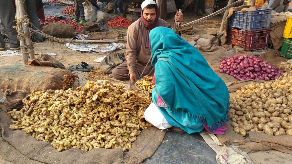 Ginger and potato vendor at Agra Market