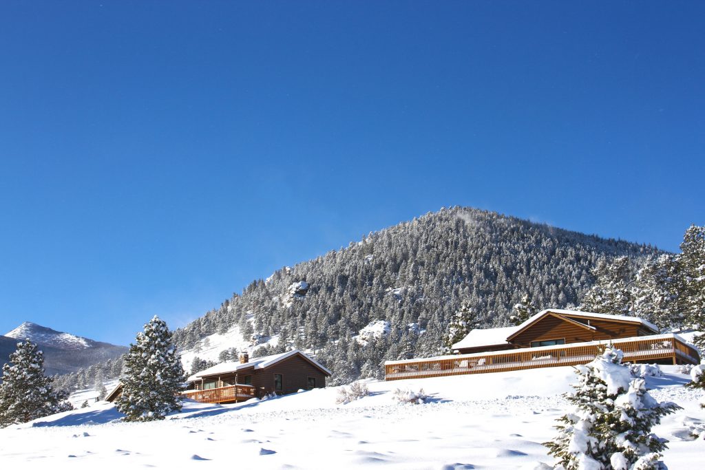 Snow clad cabins at YMCA of the Rockies, Estes Park, Colorado