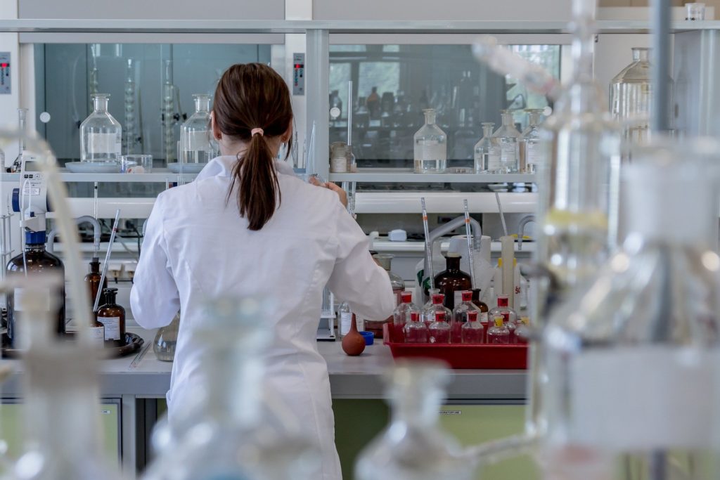 Woman lab technician doing research in lab