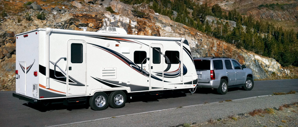 Conventional travel trailer towed by an SUV