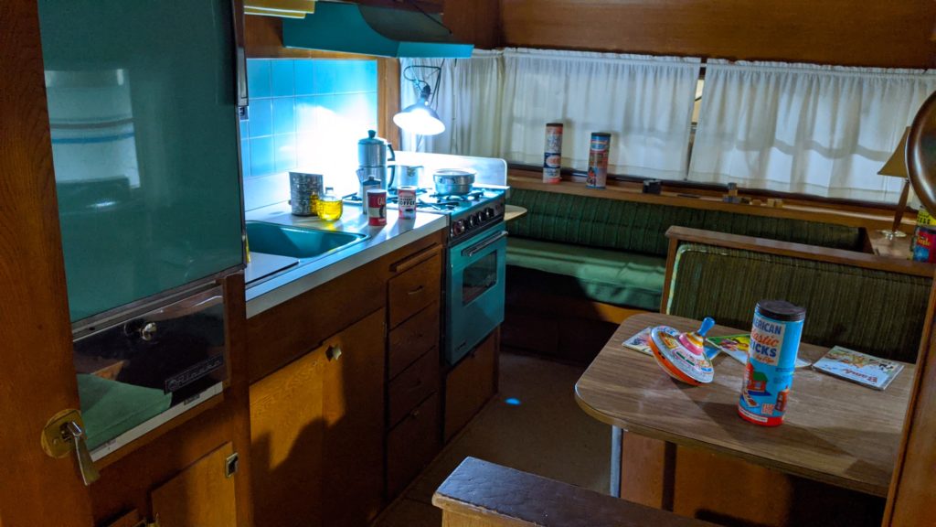 A light blue interior of a 1966 Kenskill travel trailer at Sisemore RV Museum.